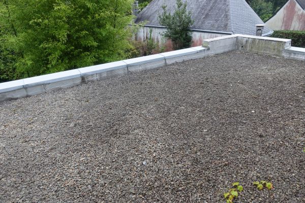 Tar And Gravel Roof Resealing